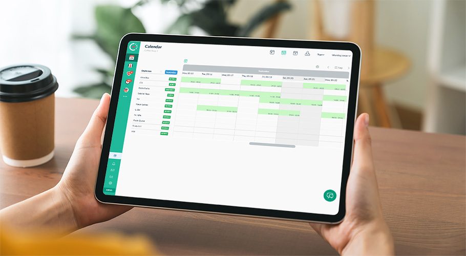 Woman holding tablet which shows the calendar view of Papershift